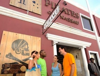 people in front of red pirate museum