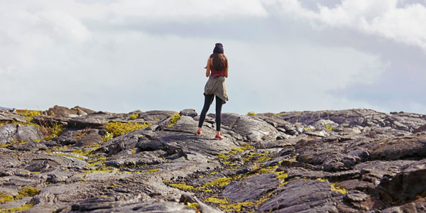 Person walking on volcano in Hawaii