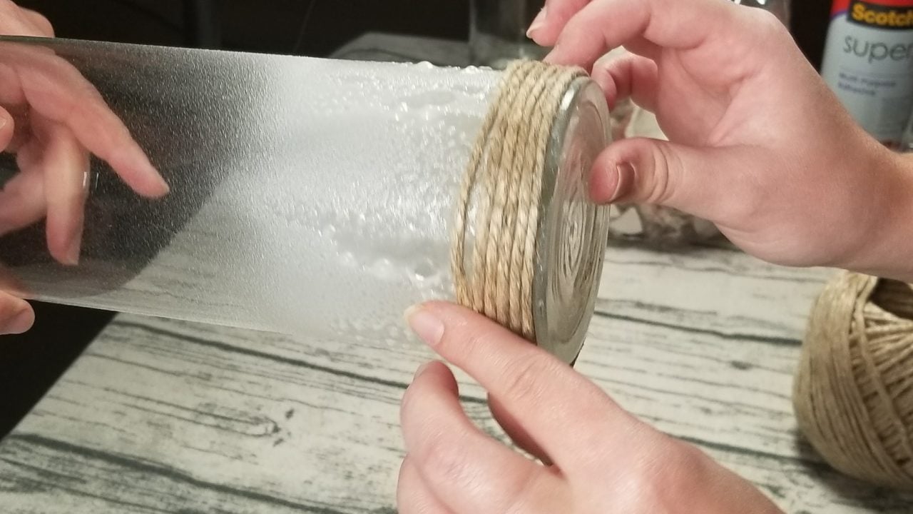 Wrapping hemp rope around the bottom of the vase