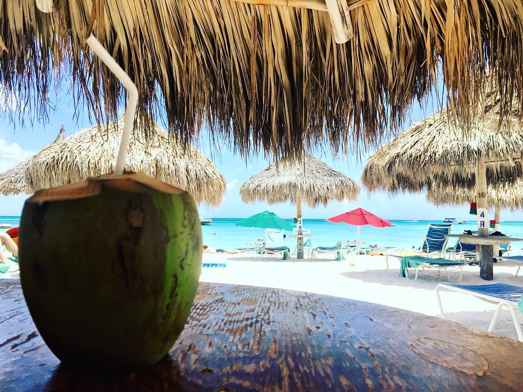 Coconut drink on the beach, Aruba