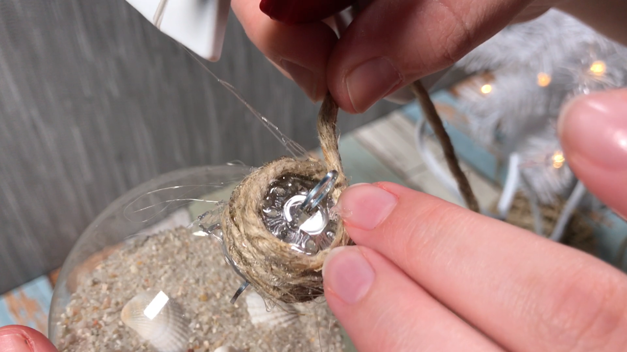 Gluing twine to top of glass ornament