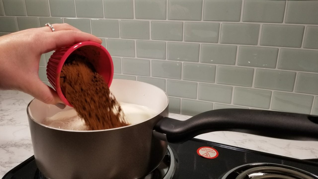 Adding unsweetened cocoa to milk, Mexican Spiced Hot Chocolate