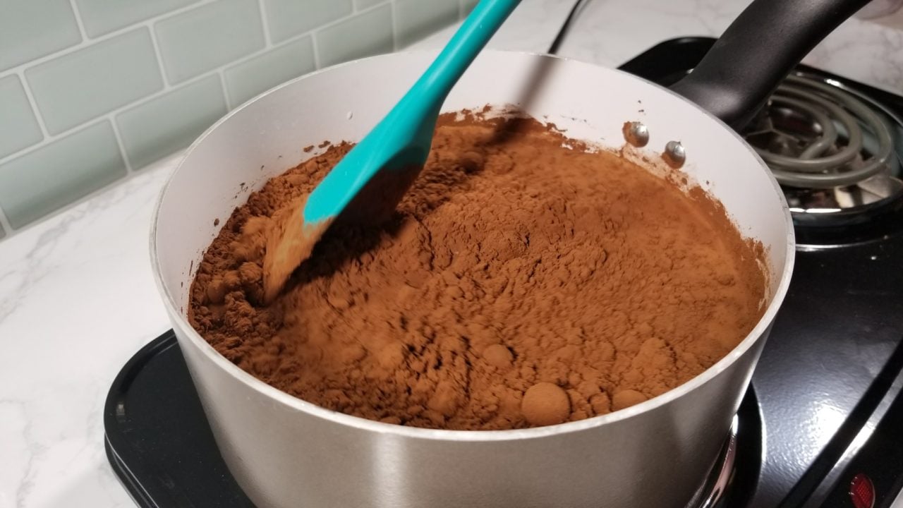 Stirring milk and unsweetened cocoa, Mexican Spiced Hot Chocolate