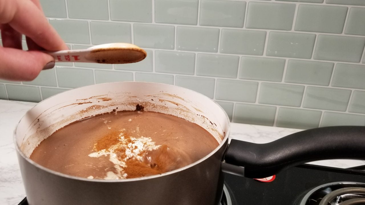 Adding cinnamon, Mexican Spiced Hot Chocolate