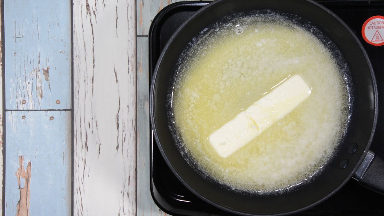 Melting butter in saucepan, Coconut Popcorn