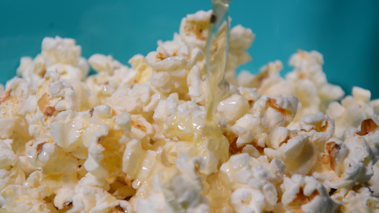 Pouring butter, Coconut Popcorn