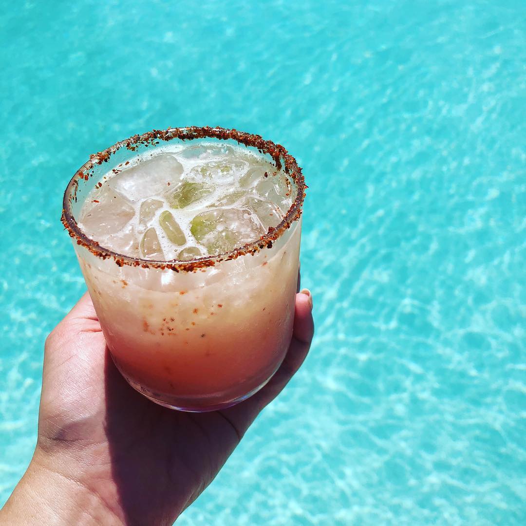 Margarita by the poolside at Secrets The Vine resort