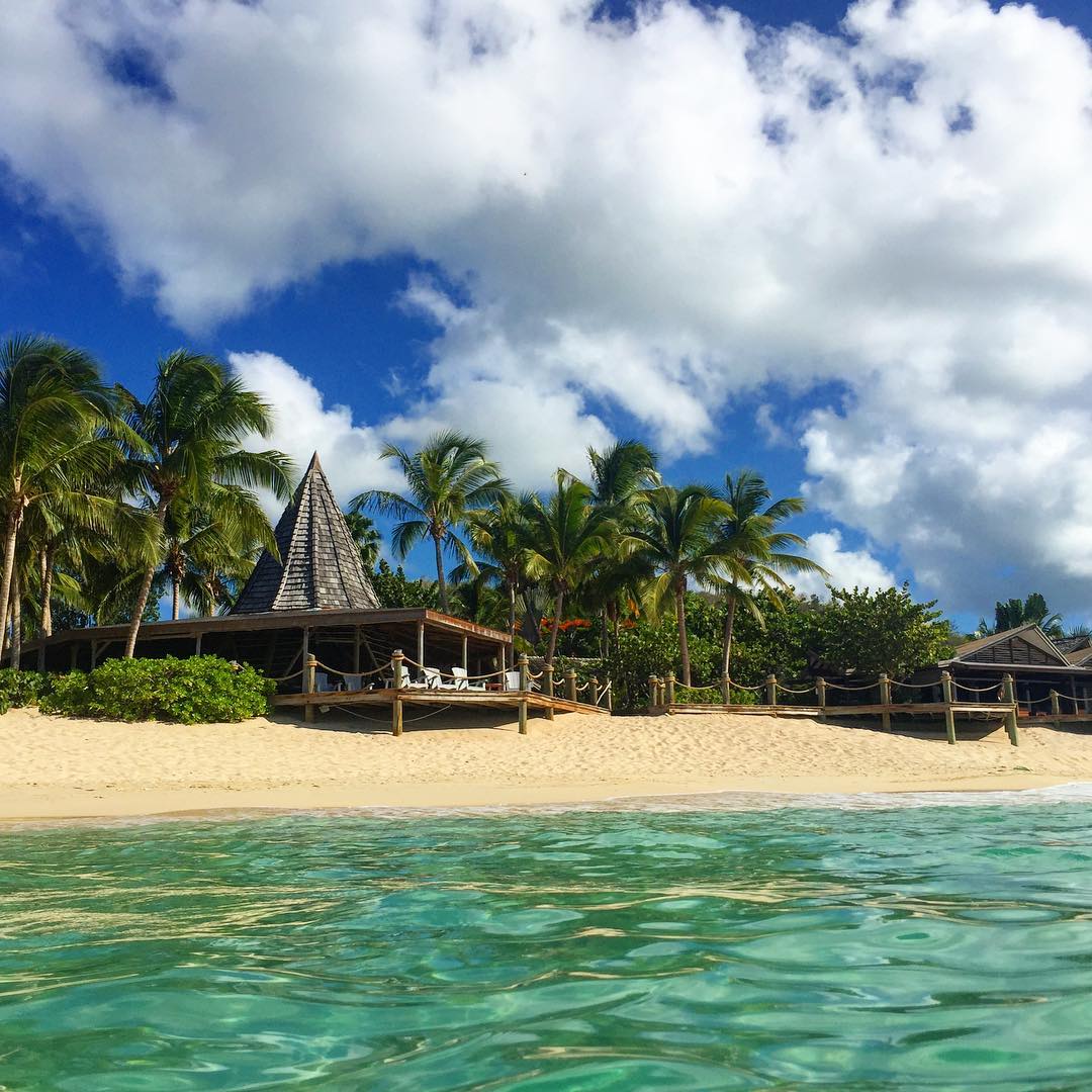 View of beach cabana from the ocean. 