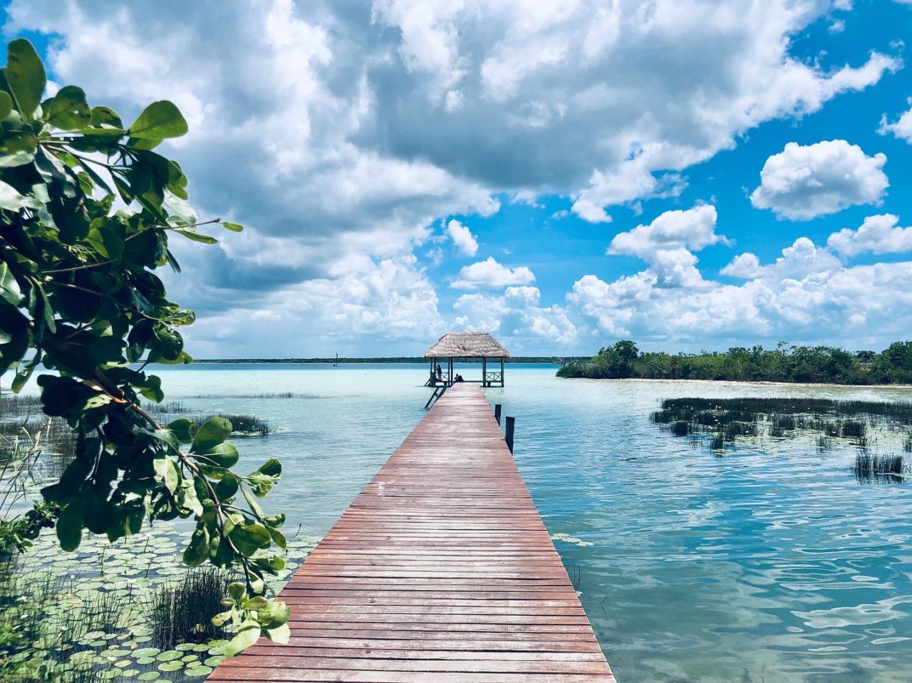 Dock extending out over lagoon. 