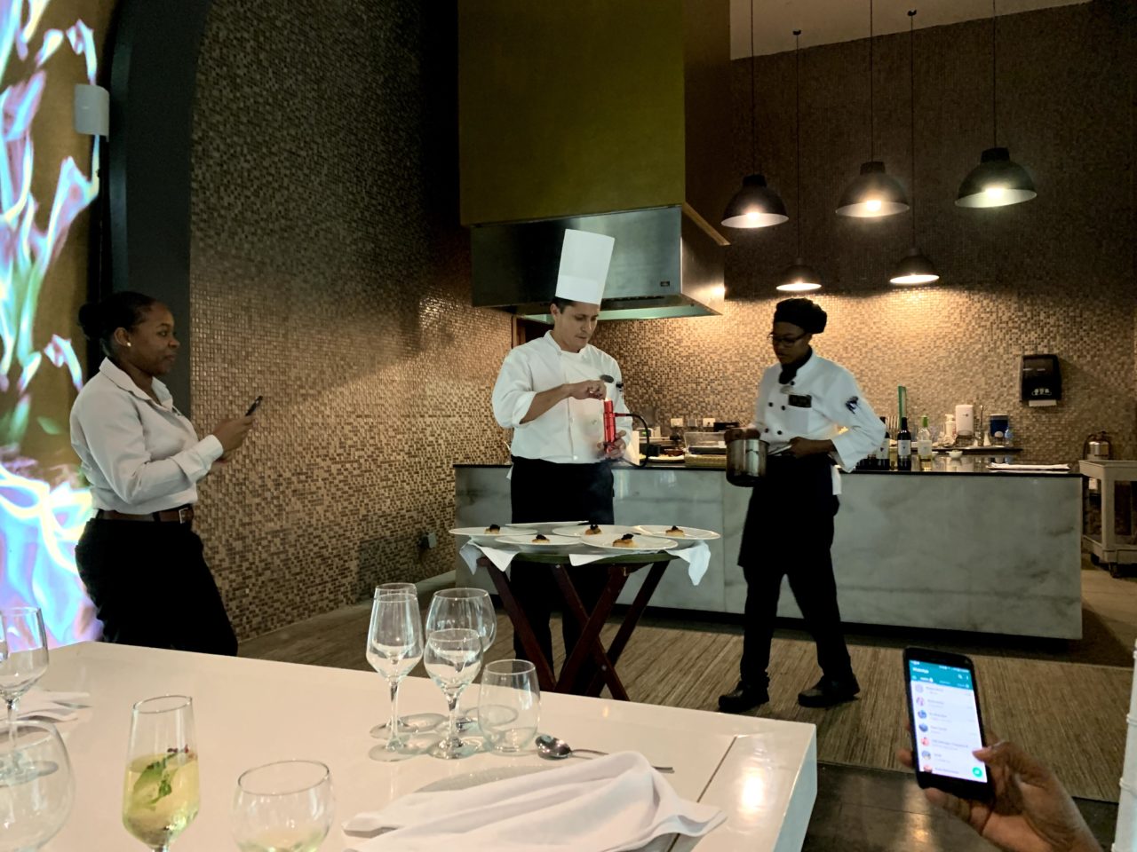 Personal chef preparing each individual dish table side. 