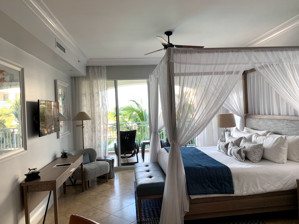 Canopy bed inside of Seven Stars suite style room. 