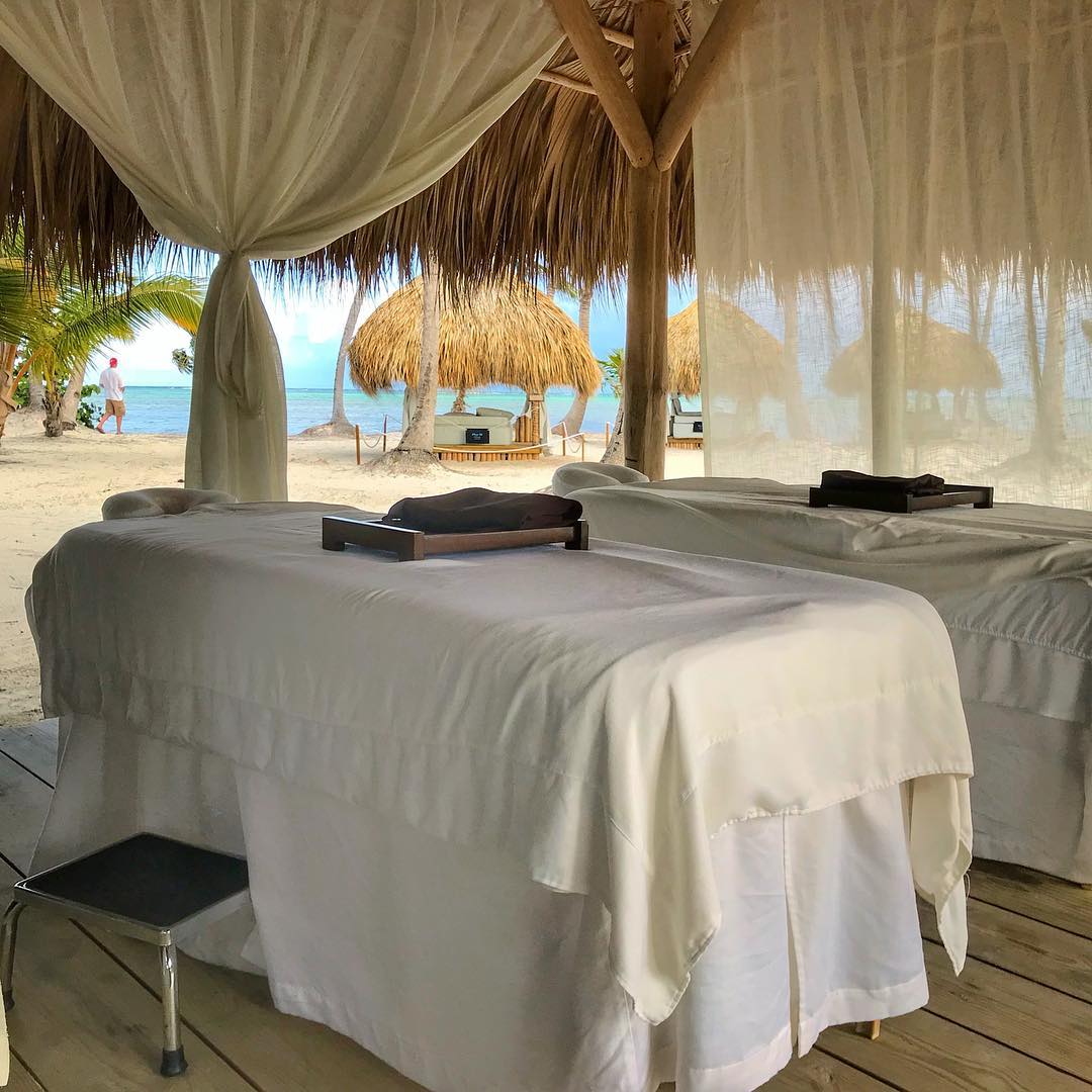 Massage tables on the beach.