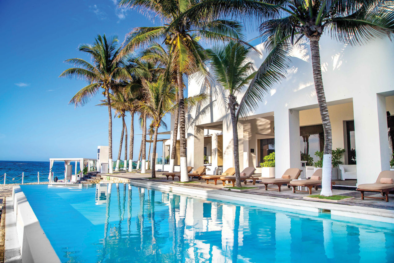 View of infinity pool overlooking the beach.