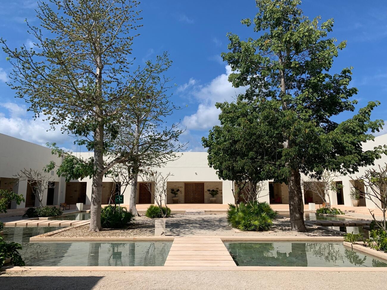 Garden area of resort between two pools.